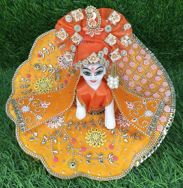 Yellow_Handcrafted_Orange_Deity_Dress_Poshak_With_Mirror_Work_Embellishments_For_Laddu_Gopal_Krishna_Idol_For_Pooja_Decoration