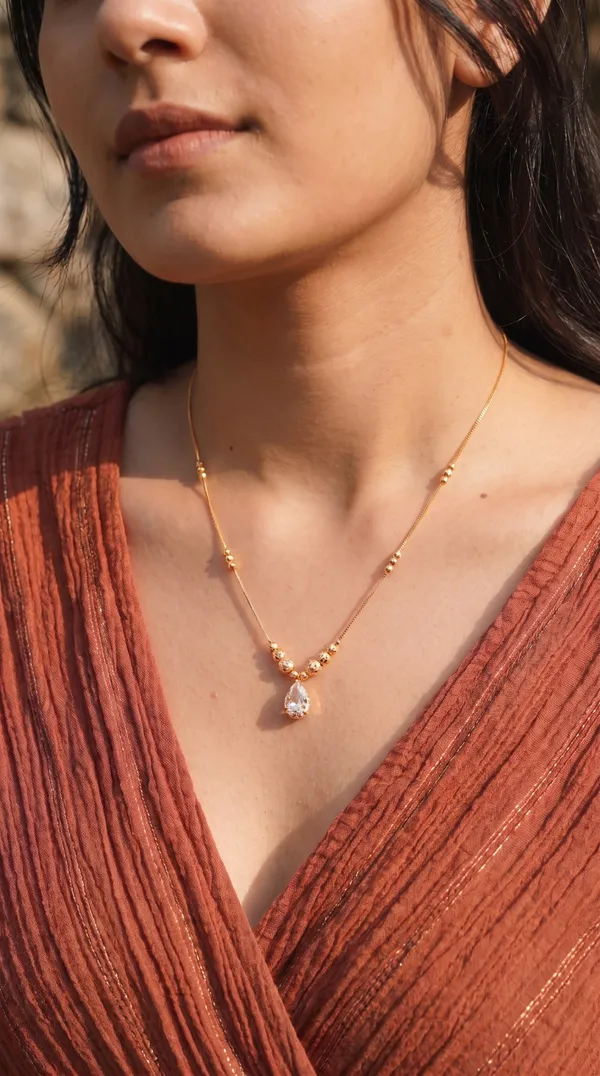 Elegant_Gold-Toned_Clear_Teardrop_Pendant_Necklace_for_Women