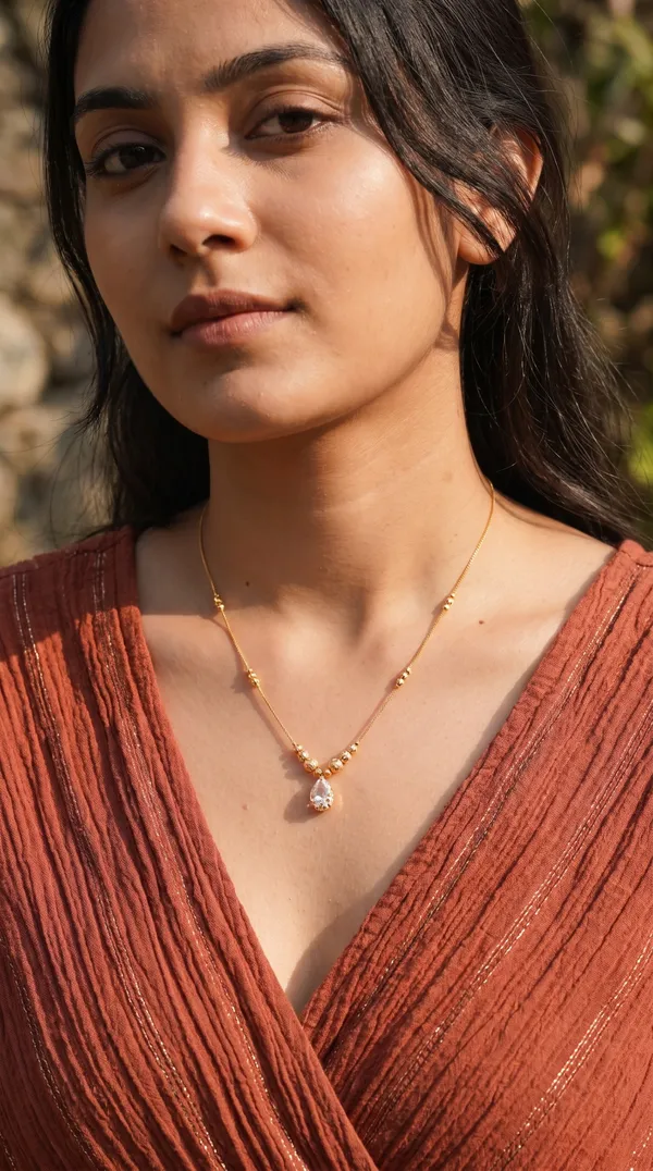 Elegant_Gold-Toned_Clear_Teardrop_Pendant_Necklace_for_Women