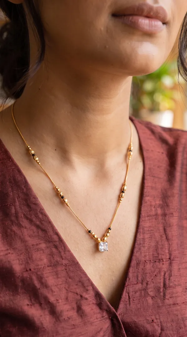 Gold-Toned_Square_Crystal_Pendant_Necklace_with_Black_Beads_for_Women