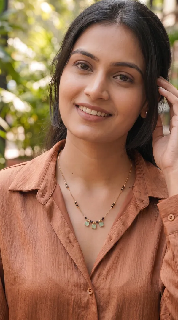 Elegant_Gold-Plated_Mangalsutra_Necklace_with_Black_Beads_&_Mint_Green_Stone_Pendant