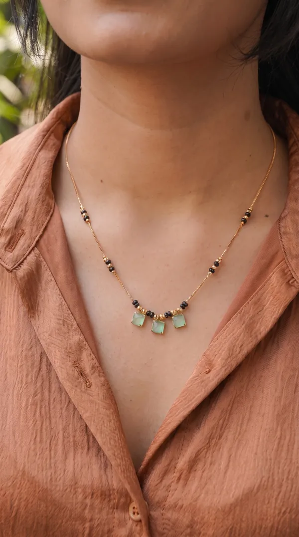 Elegant_Gold-Plated_Mangalsutra_Necklace_with_Black_Beads_&_Mint_Green_Stone_Pendant