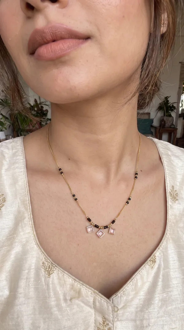 Elegant_Gold-Plated_Mangalsutra_Necklace_with_Black_Beads_&_Pink_Square_Stone_Charms