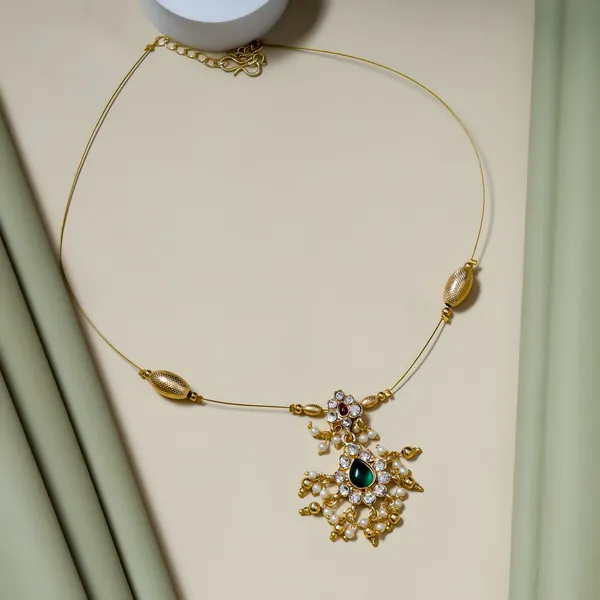 Elegant_Gold-Tone_Minimal_Pendant_Necklace_Set_with_Green_&_Red_Stone_Detailing