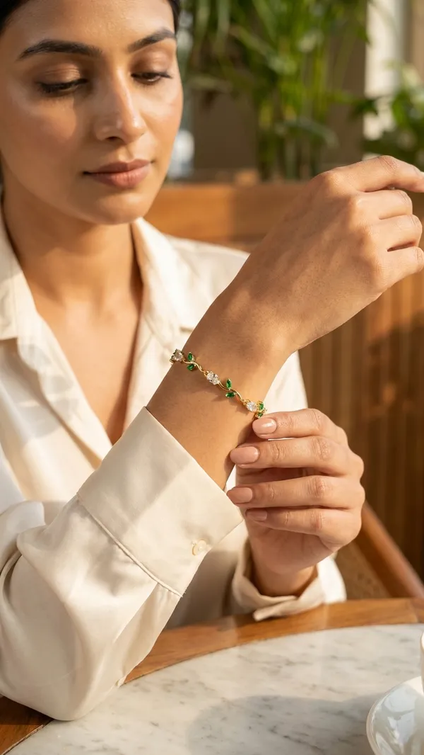 Elegant_Gold-Plated_Emerald_and_Diamond_Stimulated_Vine_Bracelet.