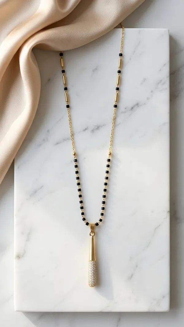 Premium_Gold-Plated_Contemporary_Mangalsutra_with_CZ_Studded_Teardrop_Pendant_and_Classic_Black_Beads_for_Women