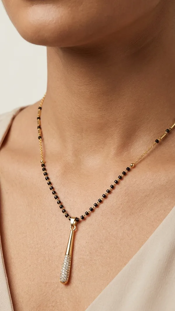 Premium_Gold-Plated_Contemporary_Mangalsutra_with_CZ_Studded_Teardrop_Pendant_and_Classic_Black_Beads_for_Women