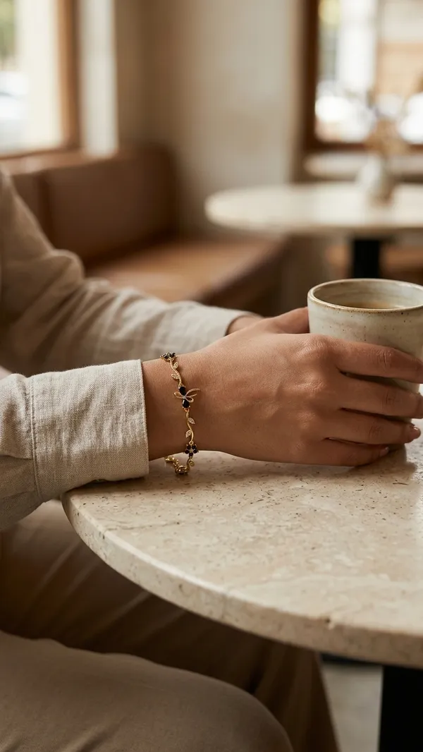 Storie_Taylor_Gold-Plated_Floral_&_Butterfly_Bracelet_with_Black_Stones