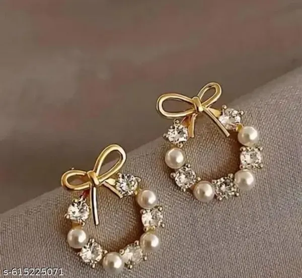 Elegant_Pearl_And_Crystal_Bow_Stud_Earrings