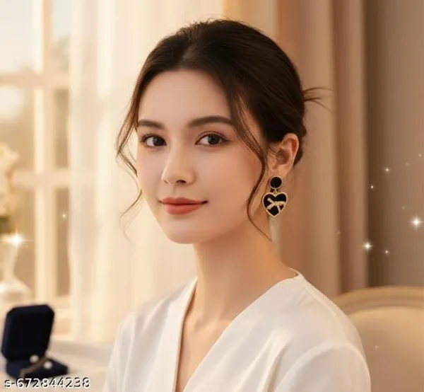 Elegant_Black_Heart_Drop_Earrings_With_Golden_Bow
