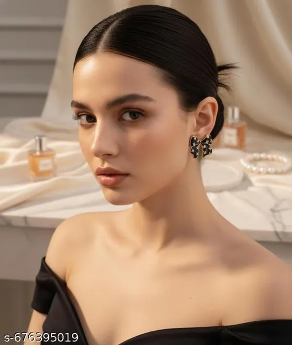 Elegant_Black_Bow_Stud_Earrings_With_Golden_Border