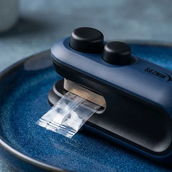Black_&_Blue_Plastic_Premium_Sealing_Machine