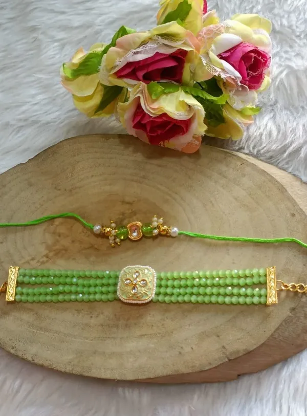 Madi_Bhaiya_Bhabhi_Jcse_Assorted,_Yarn,_Pearl,_Kundan_Chawal_Roli_Pack__Set_(1_couple_pair_rakhi_with_lumba)