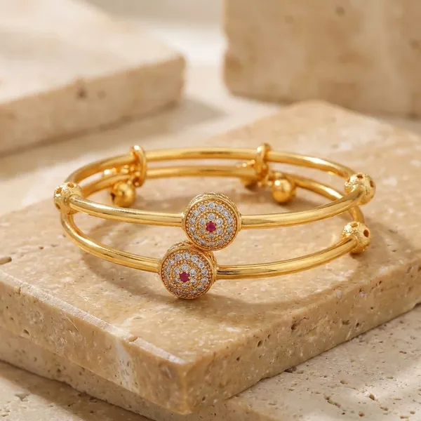 Gold_Plated_Floral_Bangle_Set_With_Pink_Stone_Embellishments_Pack_Of_2