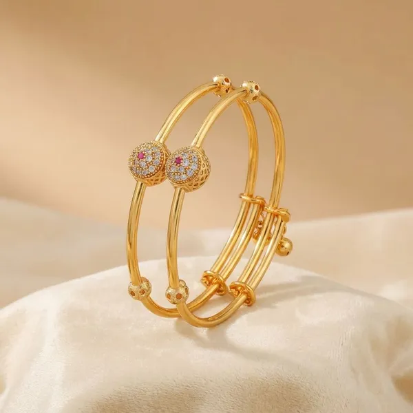 Gold_Plated_Floral_Bangle_Set_With_Pink_Stone_Embellishments_Pack_Of_2