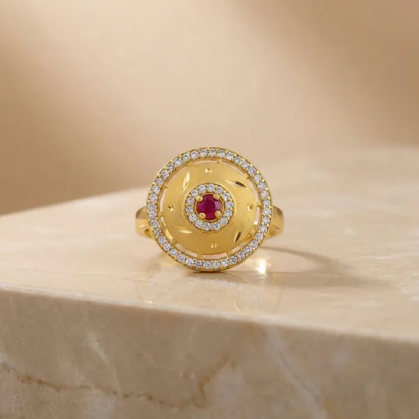 Elegant_Gold_Toned_Rotating_Gemstone_Ring_With_Crystal_Embellishments