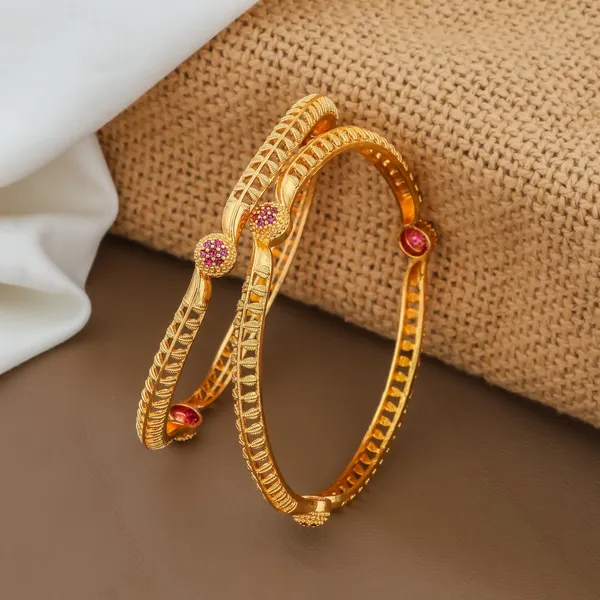 Traditional_Gold_Toned_Bangles_With_Red_Stone_Accents_Set_Of_2