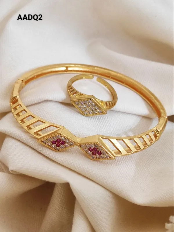 Golden_Geometric_Bangle_And_Ring_Set_With_Ruby_And_Cubic_Zirconia_Stones