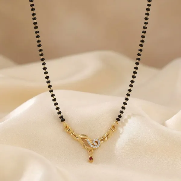 Traditional_Black_Beaded_Mangalsutra_With_Gold_Toned_Pendant