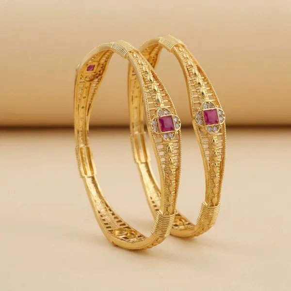 Traditional_Gold_Plated_Bangles_With_Pink_Stone_Embellishments_Set_Of_2
