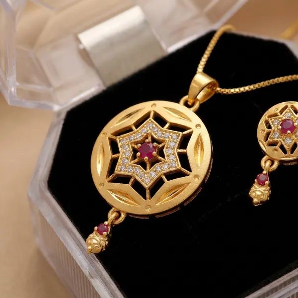 Gold_Toned_Pendant_Necklace_Set_With_Matching_Earrings_Star_Floral_Design_With_Pink_Accents