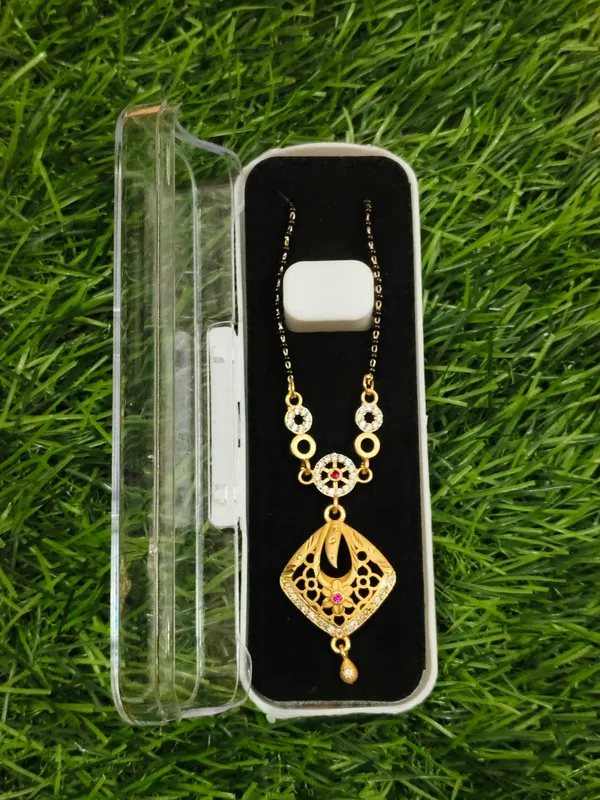 Golden_Mangalsutra_Pendant_Necklace_With_Black_Beads_And_Gemstone_Accent