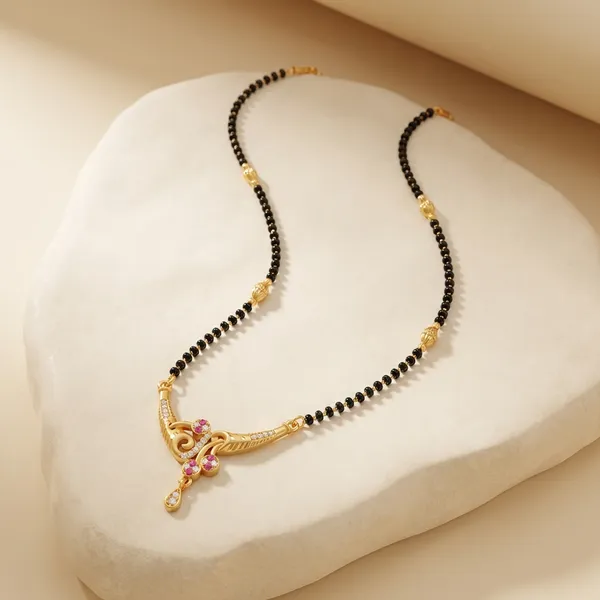 Black_Beaded_Mangalsutra_With_Gold_Tone_Pendant_And_Pink_Stone_Embellishments