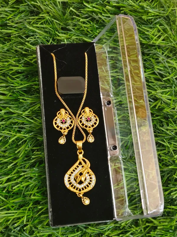 Gold_Plated_Peacock_Design_Necklace_Set_With_Red_Stone_Embellishments