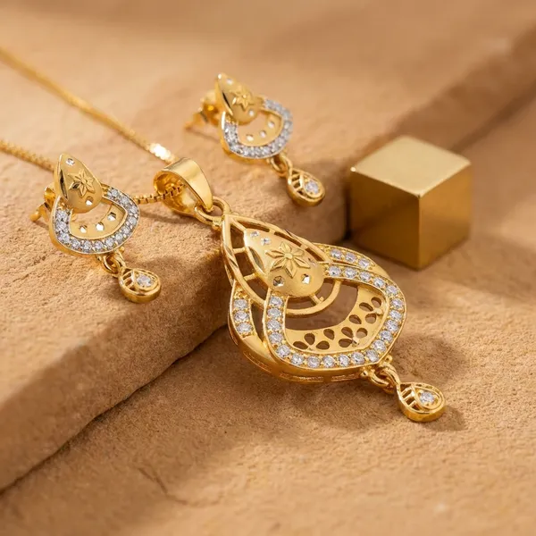 Gold_Toned_Necklace_And_Earrings_Set_With_Intricate_Detailing