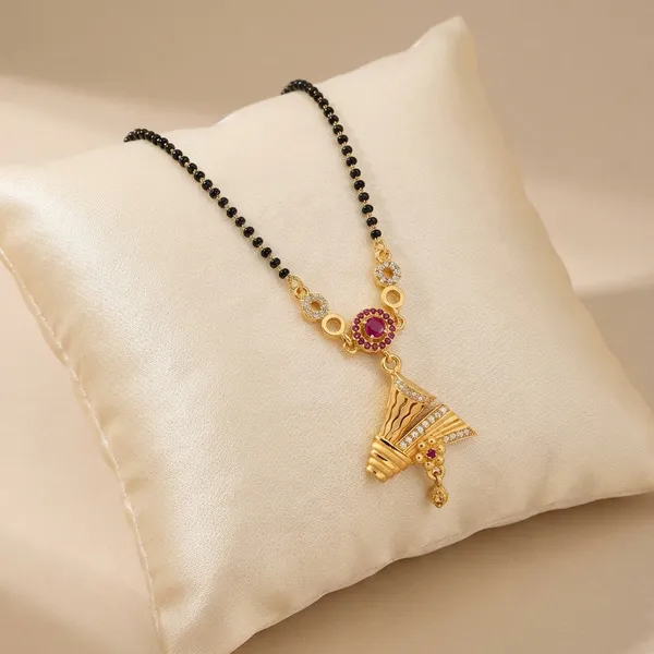 Elegant_Gold_Tone_Peacock_Pendant_Necklace_With_Pink_Stone_Accents