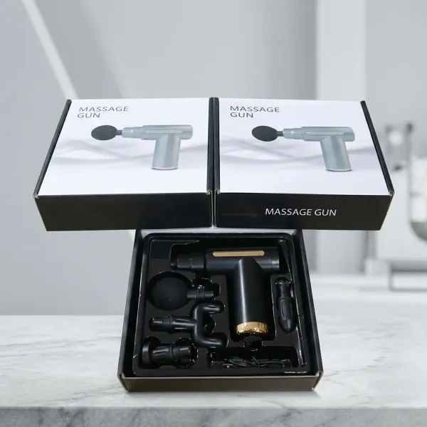 Percussion_Massage_Gun_With_Multiple_Attachments