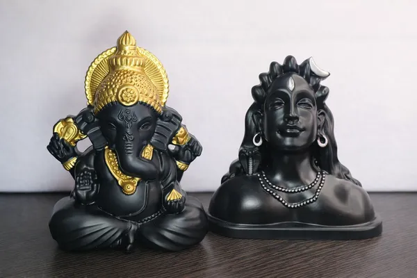 Black_And_Golden_Decorative_Shiva_Statue_And_Resin_Ganesha_Decorative_Idol_Pack_Of_2