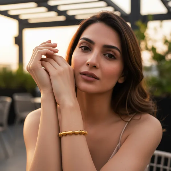 Gold_Regalia_Structured_Gold_Tone_Bangle_For_Women