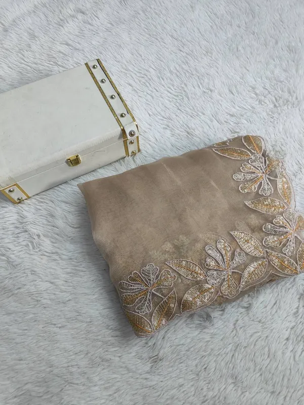 Elegant_Cream_Embroidered_Saree_with_Floral_Border_Work