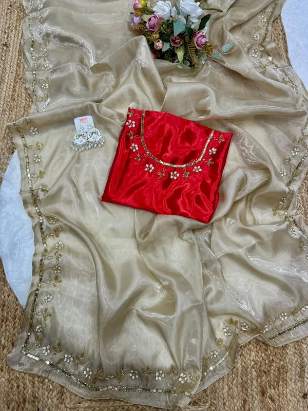 Elegant_Golden_Saree_with_Sequin_Work_and_Red_Embroidered_Blouse