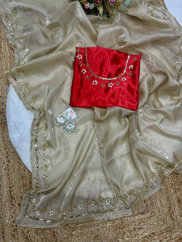 Elegant_Golden_Saree_with_Sequin_Work_and_Red_Embroidered_Blouse