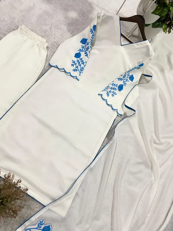 Elegant_Off-White_Embroidered_Kurta_Dupatta_Set_with_Blue_Floral_Sleeves