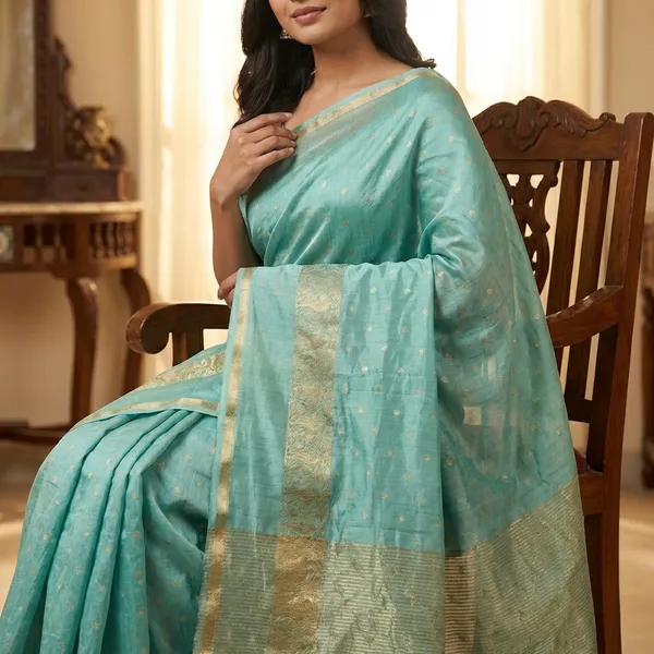 Turquoise_Blue_Silk_Saree_with_Golden_Border_and_Embroidered_Pallu