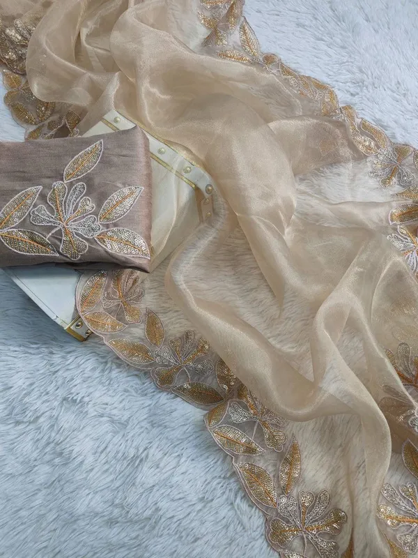 Elegant_Cream_Embroidered_Saree_with_Floral_Border_Work