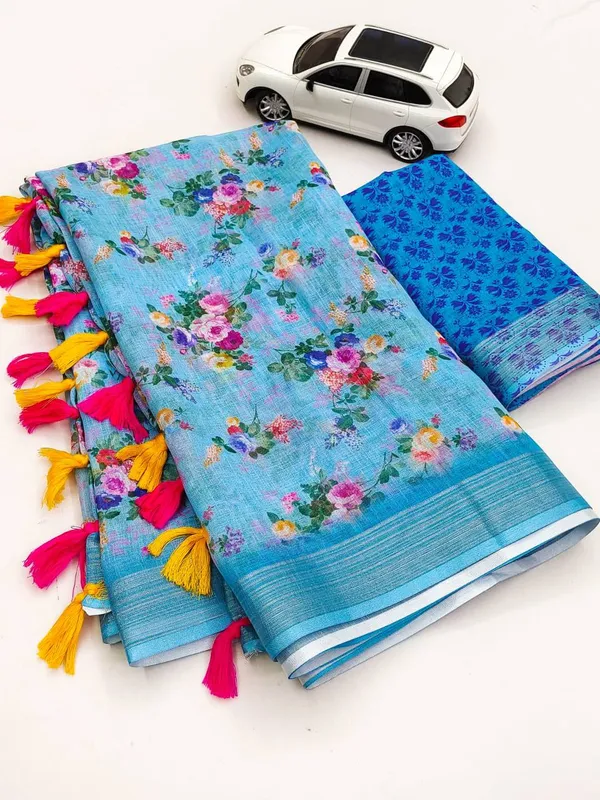 Light_Blue_Floral_Printed_Cotton_Linen_Saree_with_Blue_Border_and_Colorful_Tassel_Pallu