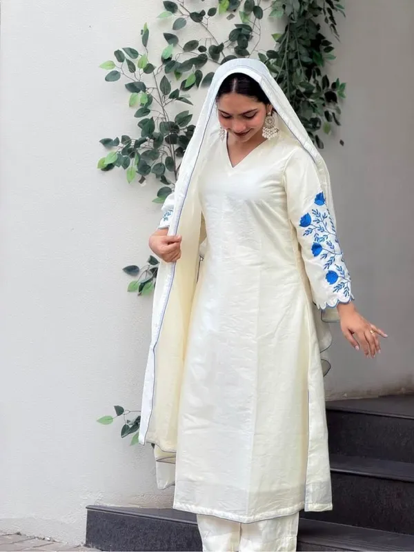 Elegant_Off-White_Embroidered_Kurta_Dupatta_Set_with_Blue_Floral_Sleeves