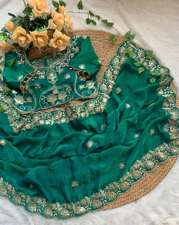 Green_Embroidered_Saree_with_Heavy_Blouse_and_Golden_Border