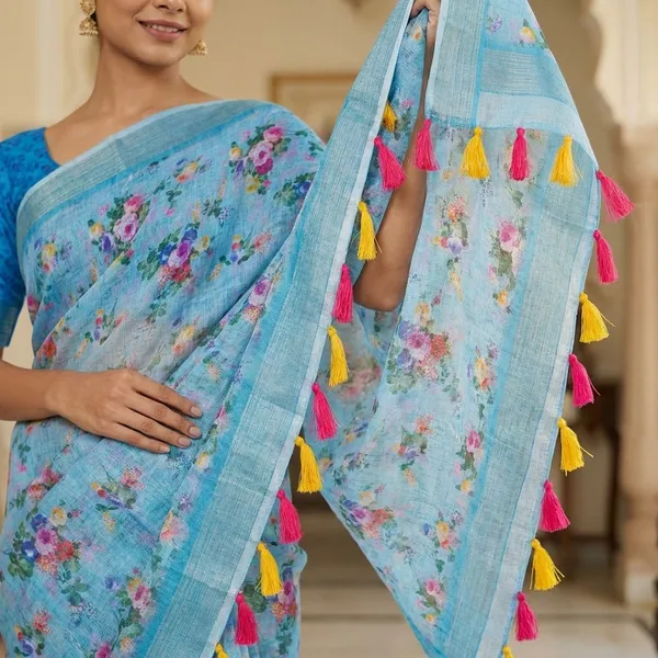 Light_Blue_Floral_Printed_Cotton_Linen_Saree_with_Blue_Border_and_Colorful_Tassel_Pallu