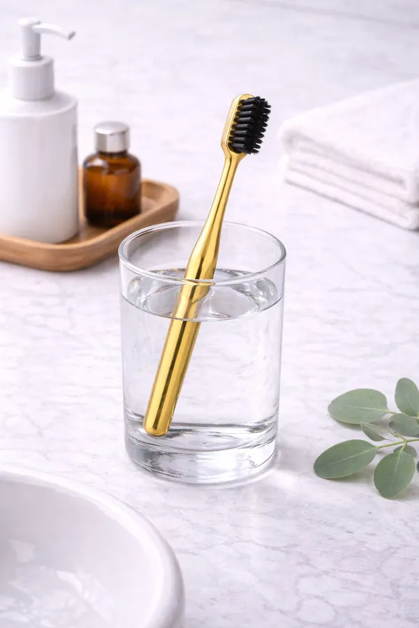 Premium_Gold_Coated_Toothbrush_With_Soft_Black_Bristles