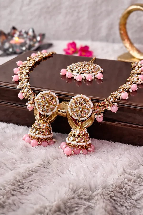 Gold_And_Kundan_Jhumka_Earrings_With_Ear_Chain_For_Women