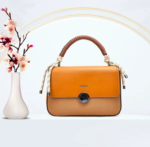 Orange_Textured_Leather_Handbag_with_Circular_Lock