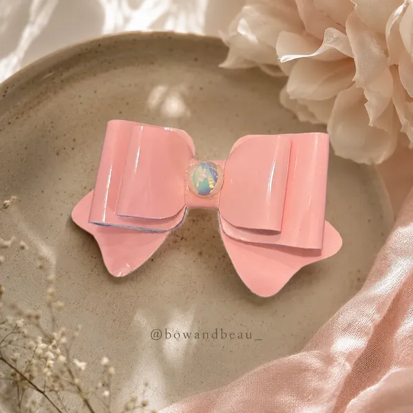 Bow_&_Beau_Glossy_Pink_Bow_Hair_Clip_with_Iridescent_Center_Stone