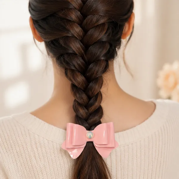 Bow_&_Beau_Glossy_Pink_Bow_Hair_Clip_with_Iridescent_Center_Stone
