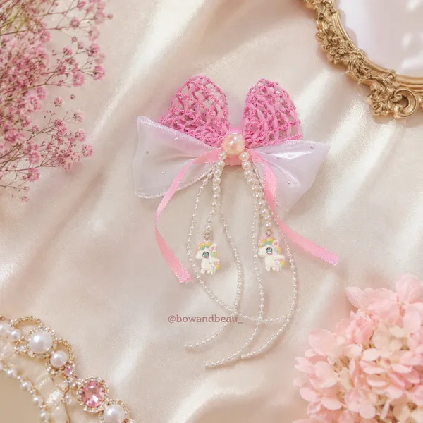 Cute_Pearl_Unicorn_Hair_Bow_Clip_for_Girls_–_Pink_&_White_Ribbon_Bow_with_Pearl_Tassels,_Unicorn_Charms_&_Secure_Alligator_Clip