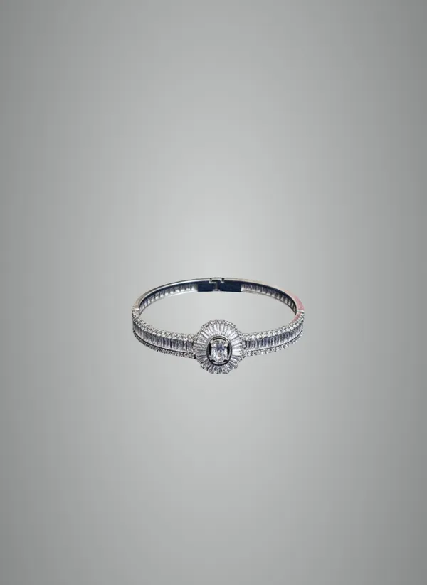 Elegant_Silver_Toned_Floral_Bangle_Bracelet_With_Baguette_Stone_Detailing
